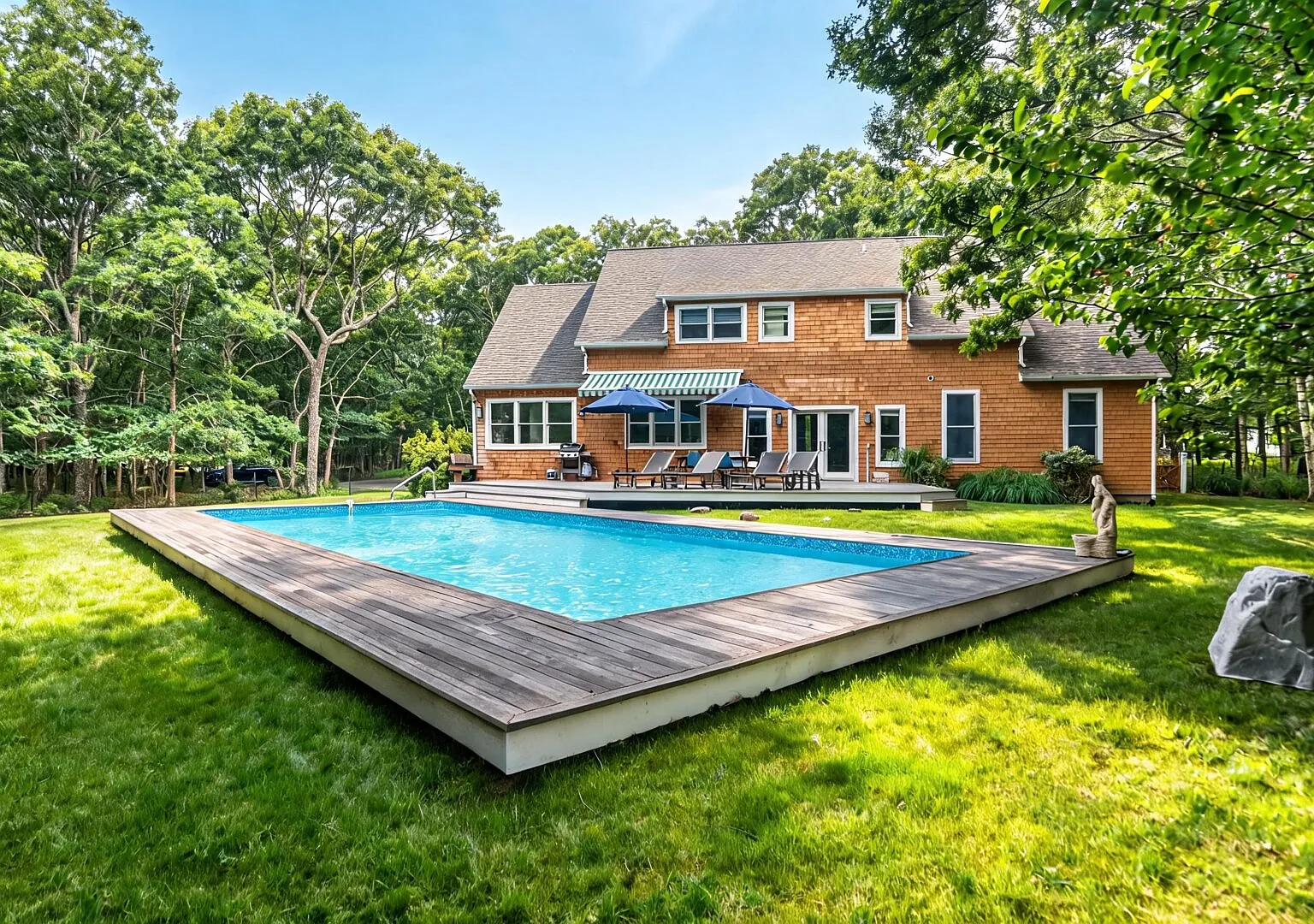 Resort-style East Hampton retreat with pool & designer interiors — Photo 2