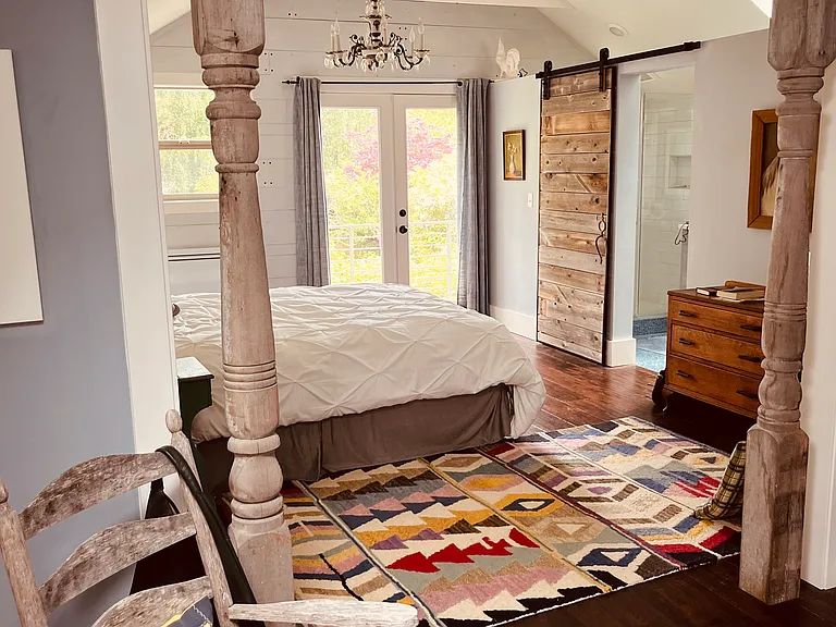 Master suite with queen mattress, bathroom, balcony, and walk-in closet