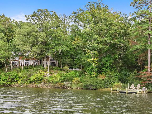 VIEWS OF MAIN HOUSE & DOCK FROM BOAT