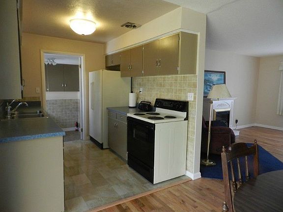 The kitchen is well connected to both the living spaces and the laundry/mud room. The current range is electric, but gas is plumbed and ready.