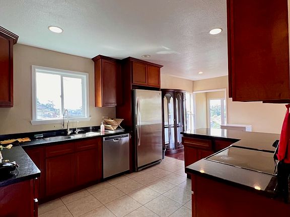 Large kitchen connected to the breakfast nook and living room--great for events and social gatherings