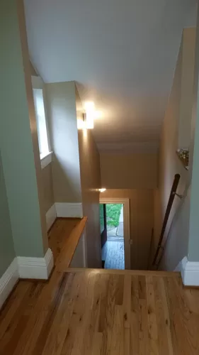 Stairwell down from inside apartment - 1043 Genesee St #1043
