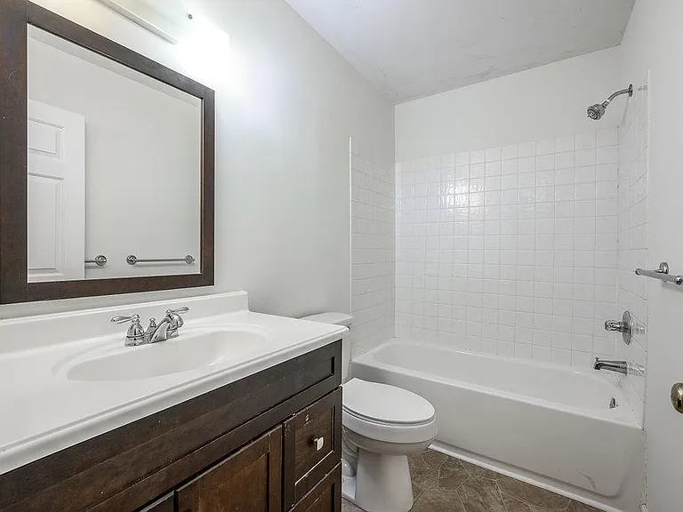Full bath upstairs to service all 3 top-floor bedrooms. Upscale fixtures!