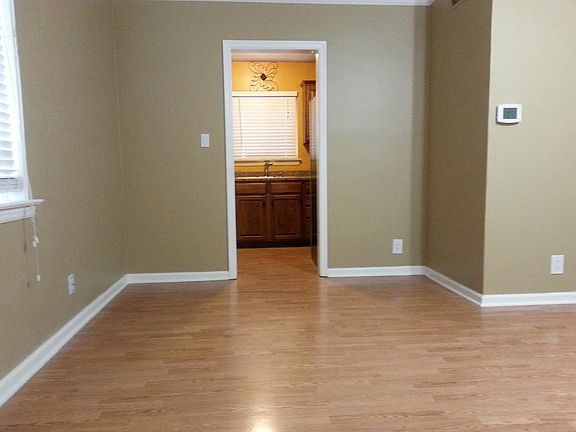 Dining area looking into kitchen