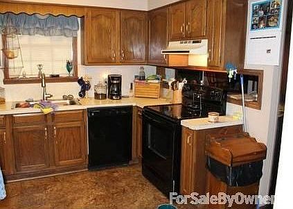 KITCHEN
						:
						NEW FLOOR, STOVE AND DISHWASHER
