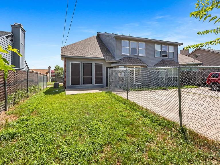 Yard with back entry and driveway for 2 cars