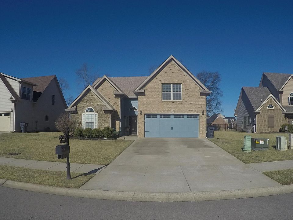 Front of house with In ground sprinkler system