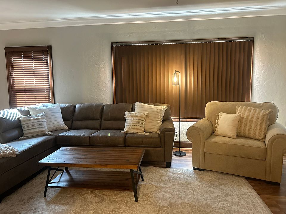 Plenty of seating and the sectional pulls out into a queen sized sofa bed. The window treatments are all brand new and help keep the heat out and create additional privacy on the ground floor.