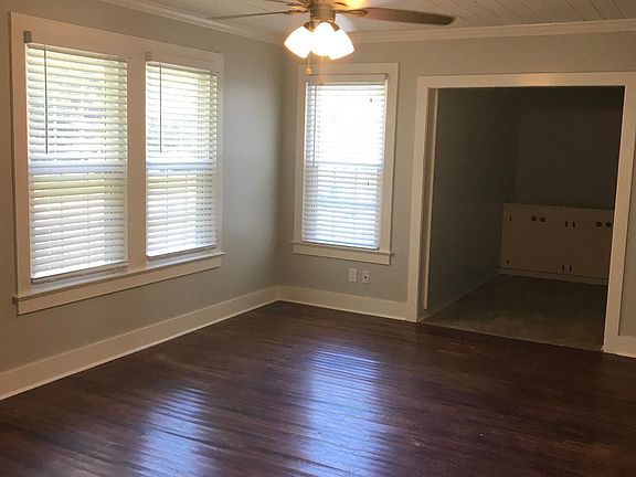 Living room with bonus room in back