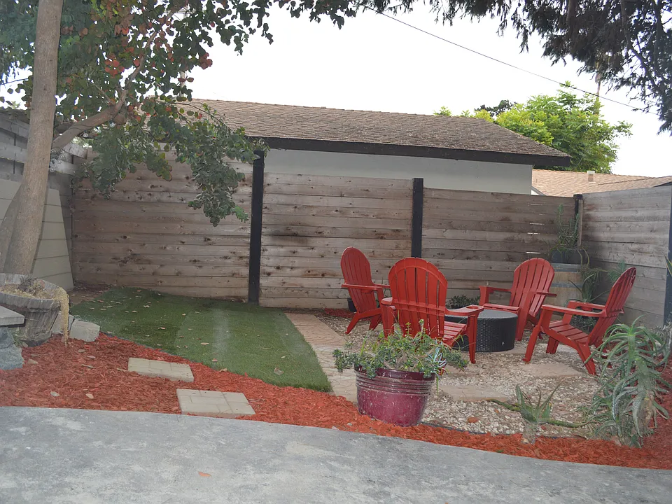 Private yard w/ stamped concrete walkway