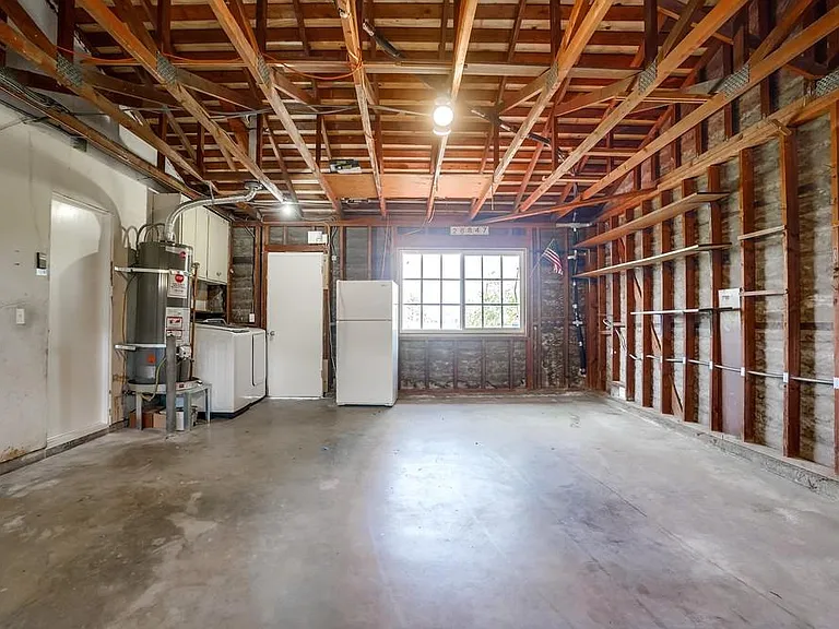 Garage with Washer/Dryer and Extra Refrigerator
