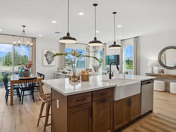 Kitchen overlooking dining area and great room