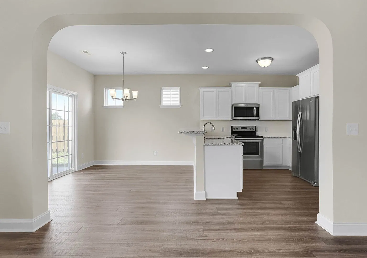 Beautiful home with a charming wrap-around front porch and open floor plan! — Photo 3