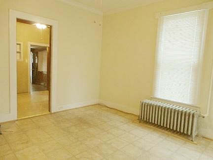 Living room towards eat in area.