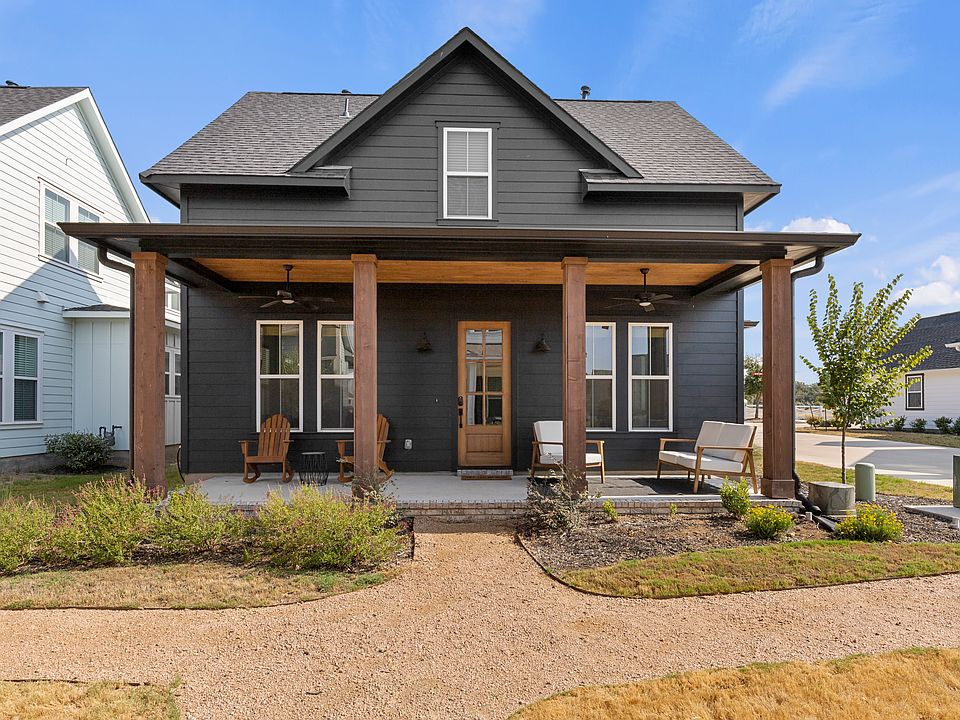 Front of home. Two car garage in rear