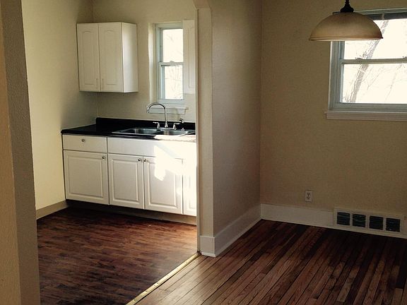Functional kitchen with dining area.