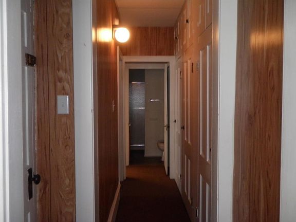 hallway lined with closets