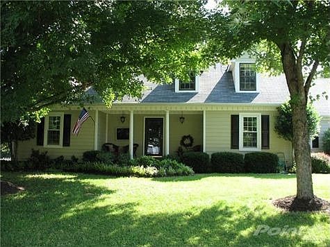 This house has been remodeled with a new granite, stainless steel kitchen, professionally fenced bac