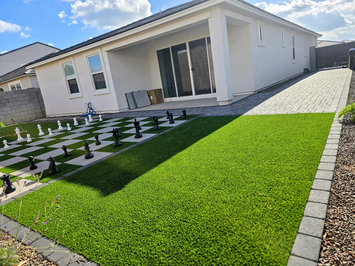 Fully furnished backyard with:
-Built-in patio
-Paver for additional parking
-In ground Chess pattern turf - 7378 W Buckhorn Trl