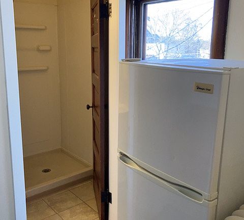 Fridge and bath entry off kitchen