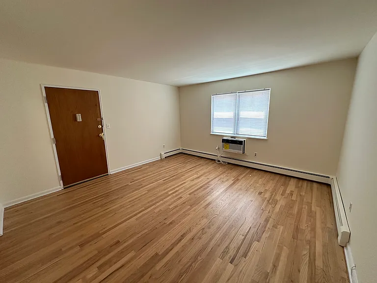 Living Room with New Air Conditioner, Wall Unit