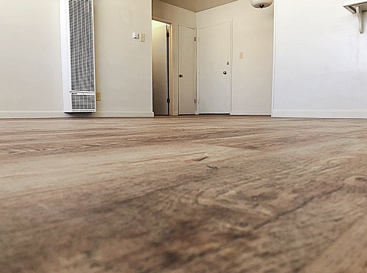 Premium-quality vinyl plank flooring throughout