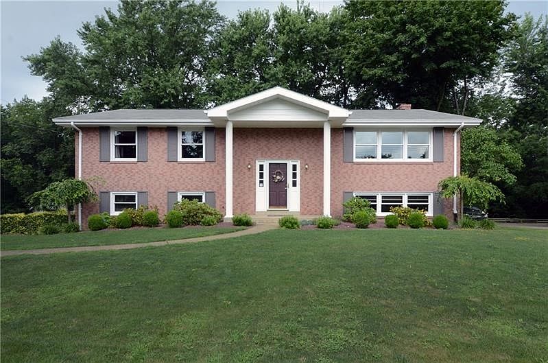 Welcome to 203 Shafer Rd.!! A 4 bedroom Split entry Brick Beauty!