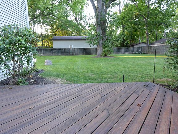 Back yard from private wood deck.