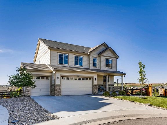 Private lot flanked by open space on one side.