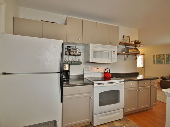 This kitchen packs a big punch with stylish painted cabinets and new countertops with loads of storage. There is plenty of counter space for even the best cooks.