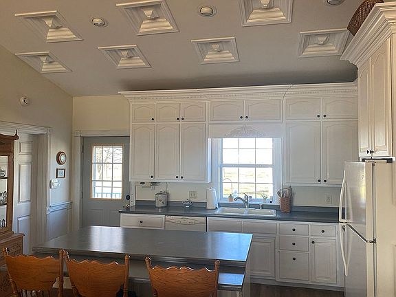Kitchen with custom ceiling