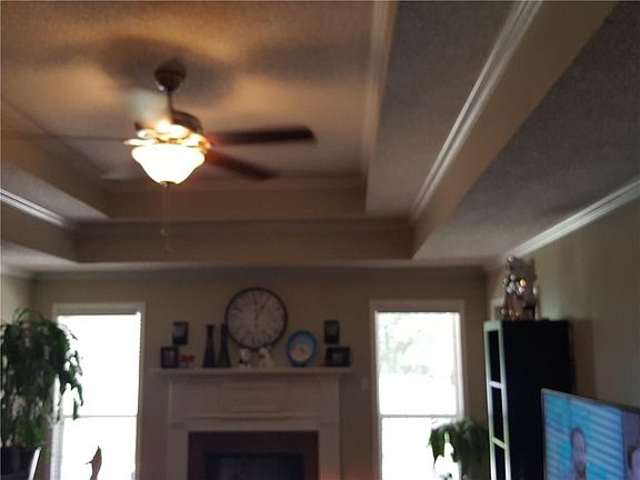 Family room with architectural ceiling