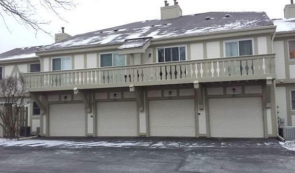 Back of unit with 3rd garage from left.