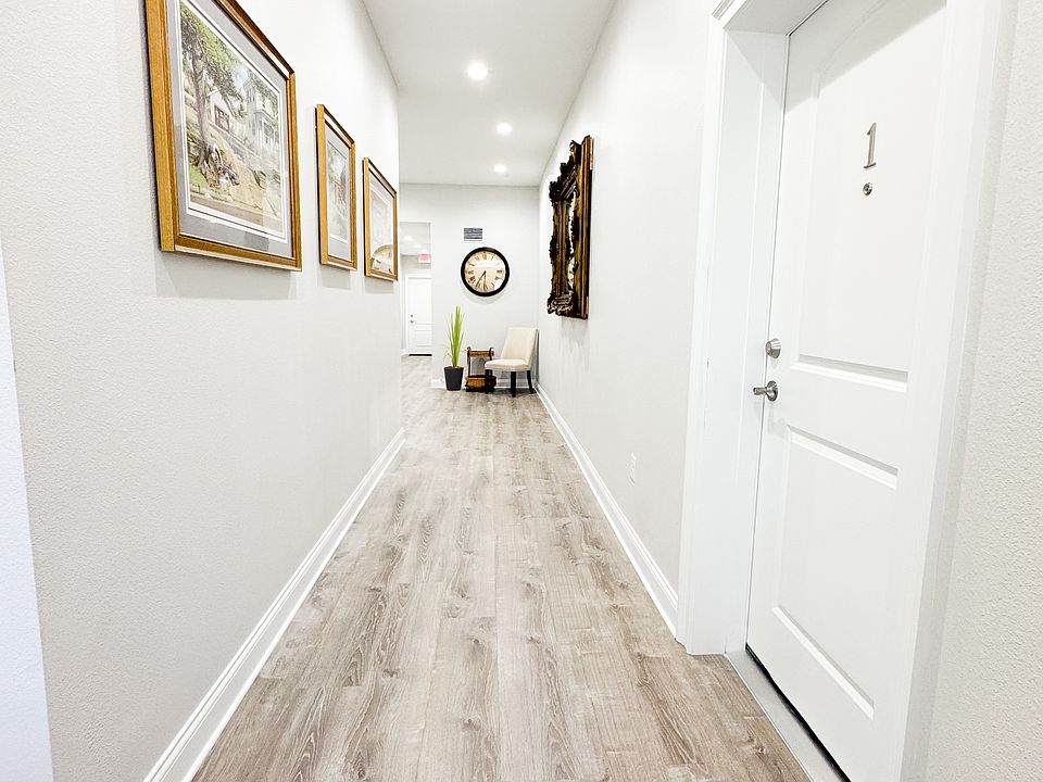 Common entrance on main floor. One apartment on each side of main hall so no wall is shared with another tenant. Two other apartments are on the second floor.