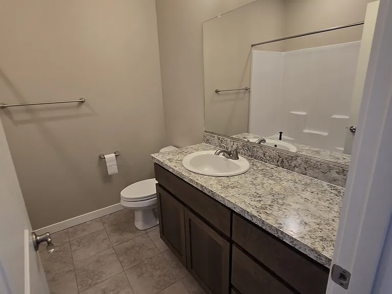 Bathroom also on third floor near second bedroom. Has tub/shower, toilet and sink. Plenty of storage.