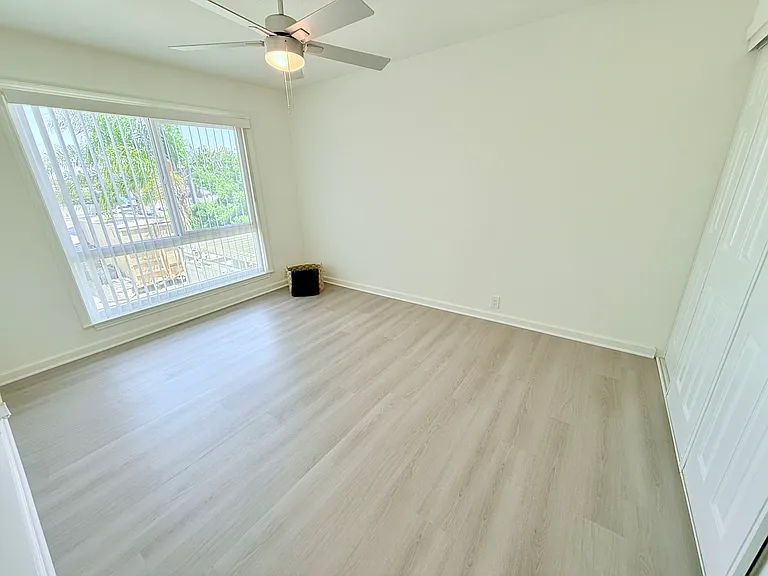 Bedroom 2 with Ceiling Fan & New Flooring Unit 22