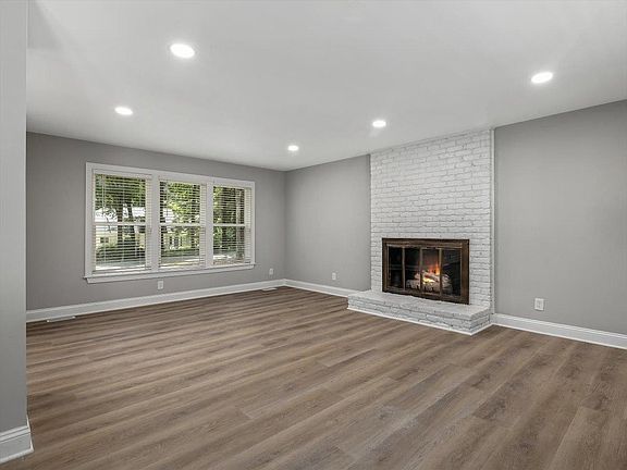 Large den with gas fireplace