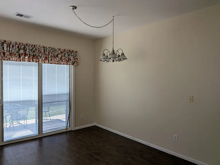 Spacious dining room with mountain views.