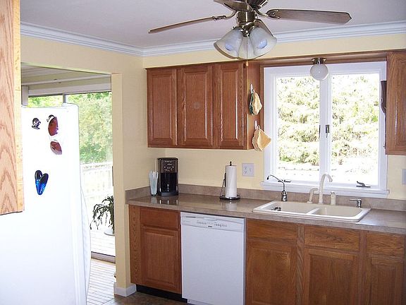 New oak cabinets, counter tops, flooring and dishwasher