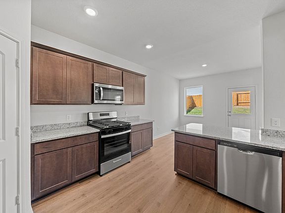 The kitchen has energy efficient appliances.