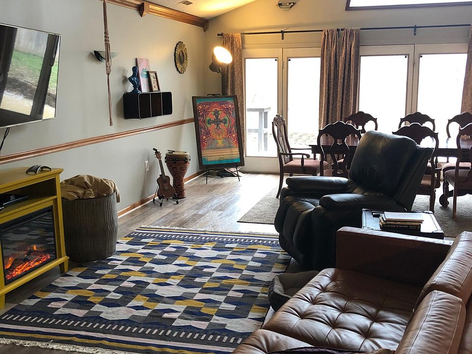 700 Square foot Great room with Cathedral Ceilings and three french doors that leads you to beautiful private patio (Rare find for this area)