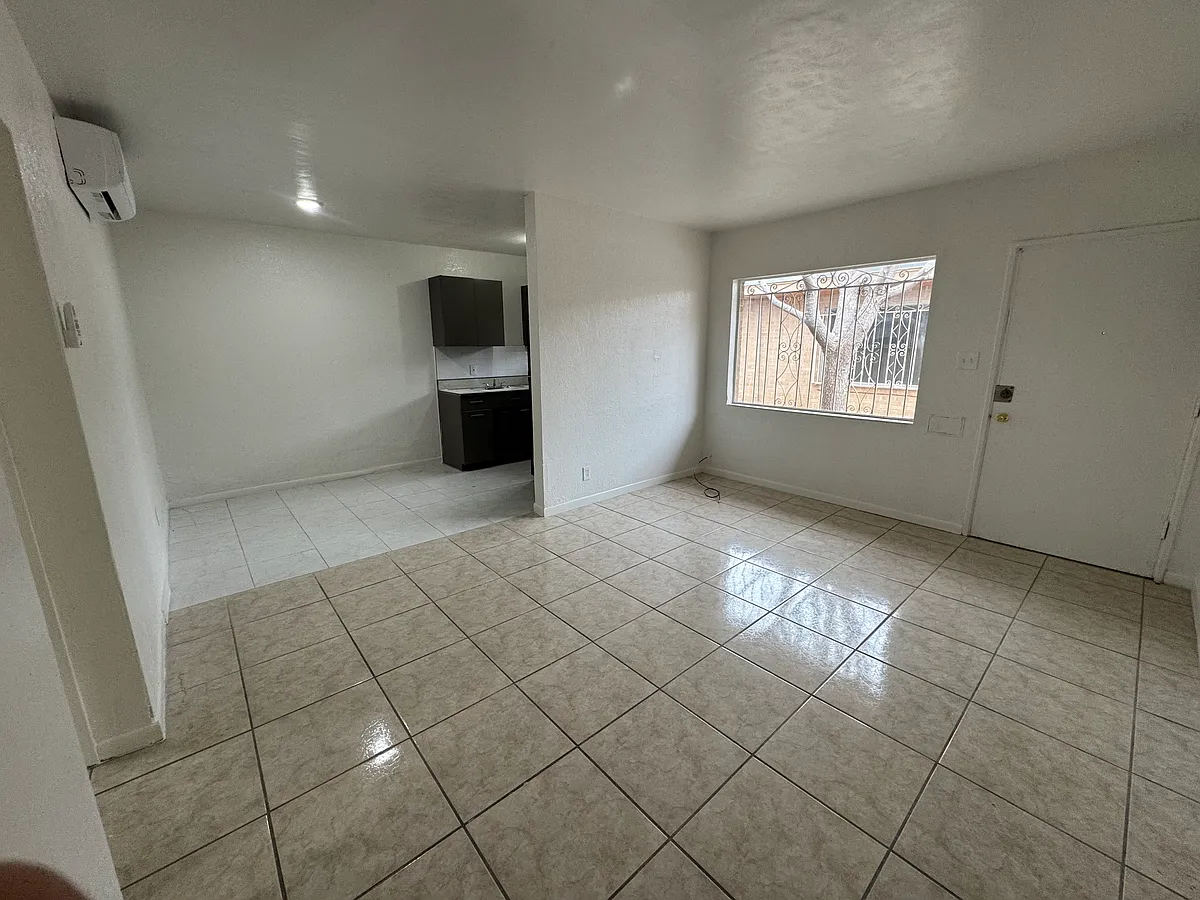 New Floor Tile 
Fresh Paint - White All Around the Apt - 1501 N Oregon St #4