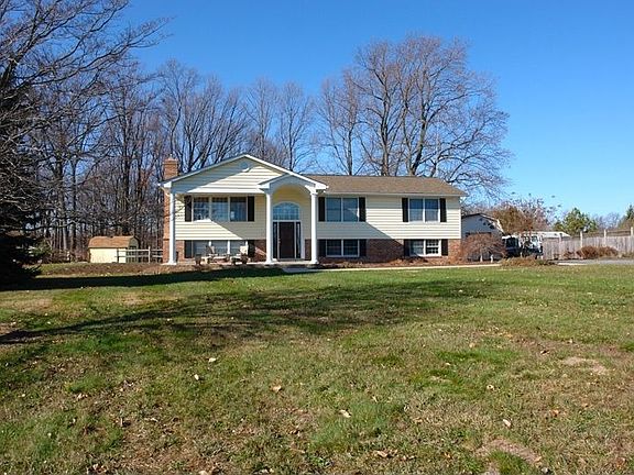 Large yard with gardens