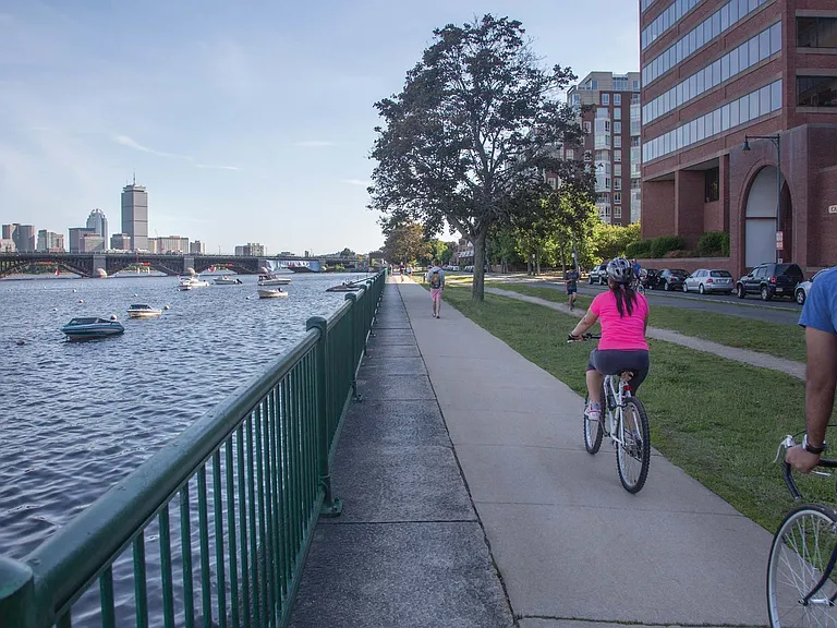 Walk, run or bike along the Charles River trail overlooking the Boston Skyline