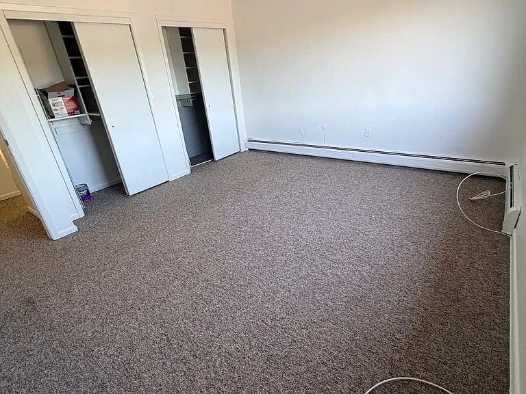 Bedroom with ample closet space