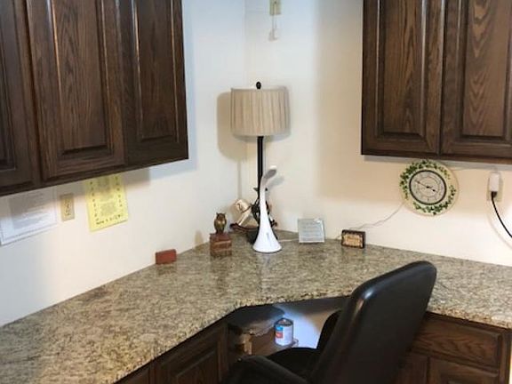 Updated office area with new cabinetry for additional storage