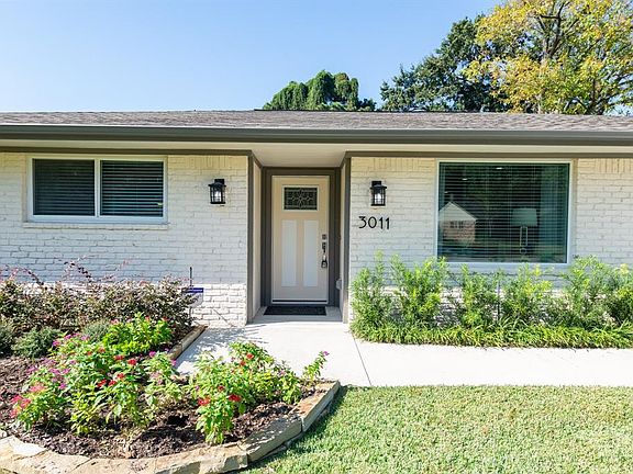 Front Entrance: Features include recent roof, gutters, double pane windows, fresh landscaping.