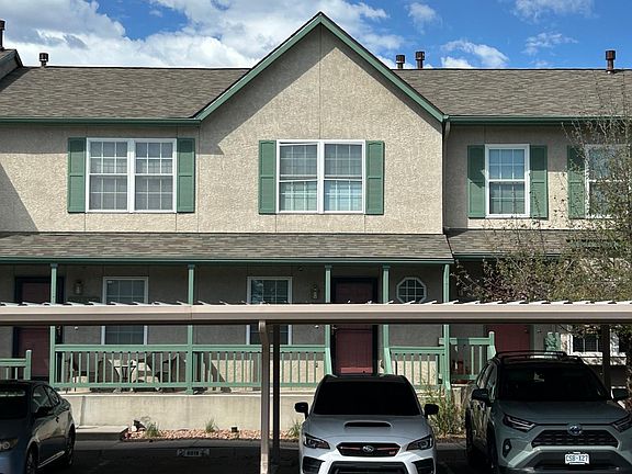 Covered parking spot directly in front. Second uncovered spot-on other side of driveway. Only room for vehicles.