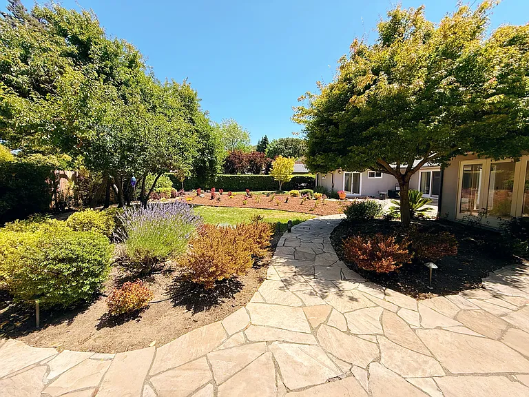 Huge backyard with beautiful newer landscaping
