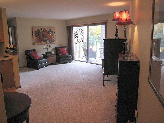Oversized patio door with quaint outdoor patio, freshly painted throughout!